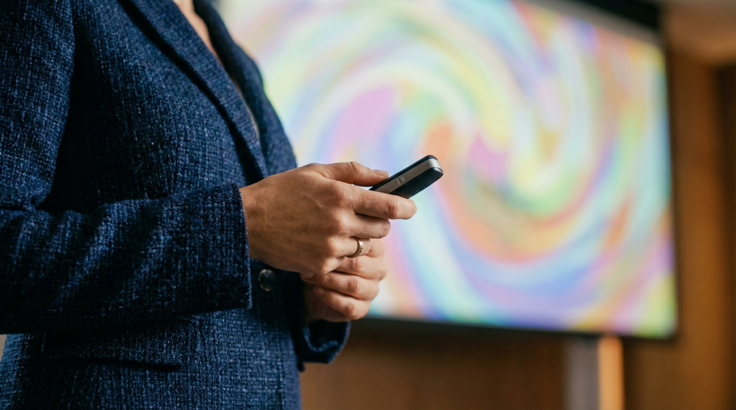 Professional presenter holding wireless clicker